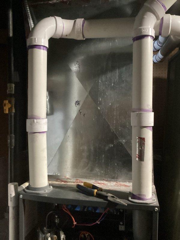 Performed scheduled one-time furnace tune-up, inspecting condensate drainage system with particular attention to PVC piping and connections. Verified proper drainage configuration and checked all connections for leaks. System operating normally after service with no issues identified.