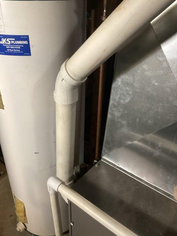 Performed scheduled furnace tune-up on Lennox HVAC system. Inspected PVC venting, connections, and drainage components in mechanical room. No issues were identified during service; system is operating normally with new filter installed.