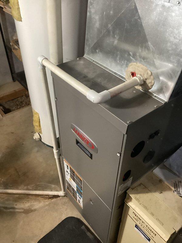 Performed scheduled furnace tune-up on Lennox HVAC system. Inspected PVC venting, connections, and drainage components in mechanical room. No issues were identified during service; system is operating normally with new filter installed.