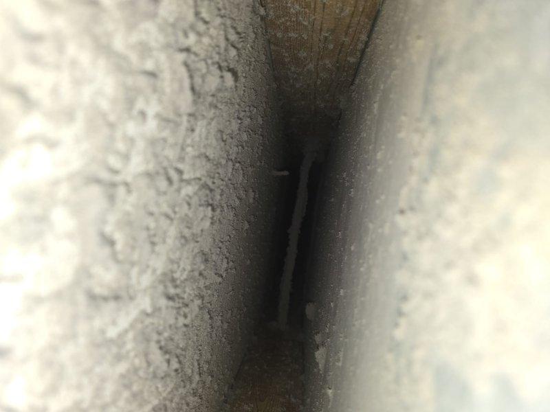 Performed comprehensive duct cleaning service on HVAC system, arriving between 7:30-8:00am as scheduled. Removed significant dust and debris accumulation from ductwork as evidenced by inspection photos showing particulate buildup on interior surfaces of cylindrical ducts. Thoroughly cleaned all supply and return vents to improve system airflow and indoor air quality.