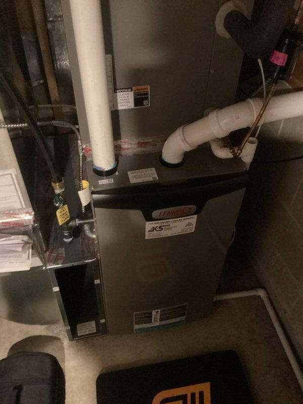 Performed scheduled tune-up service on the customer's furnace/air handler system. Inspected all components including PVC venting, condensate drainage, and electrical connections. System was found to be in good working order with no issues identified. All operations verified and unit is functioning properly after service.
