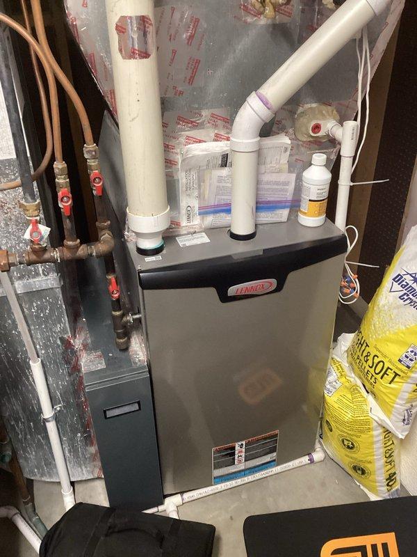 Performed scheduled preventative maintenance on Lennox air handler system. Conducted comprehensive diagnostic testing using combustion analyzer, confirming proper CO2 levels and air/fuel ratio at 57.6%. System functioning normally with all components properly maintained and operational.