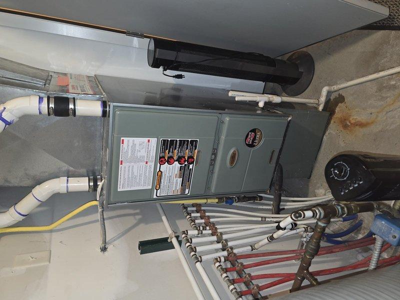 Performed comprehensive duct cleaning service between 12-3 PM, removing accumulated dust and debris from the HVAC system. Cleaned all vents and inspected the flexible ductwork and Ruud furnace unit, ensuring proper airflow and system functionality throughout the home.