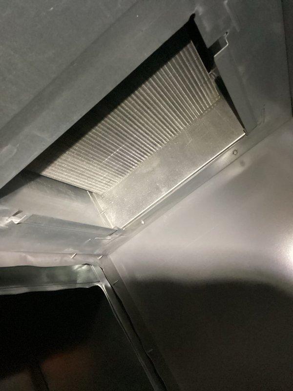 Responded to a no heat call for a furnace experiencing intermittent operation. Diagnostic inspection revealed secondary heat exchanger severely clogged with household dust and debris from humidifier. Performed thorough cleaning of secondary heat exchanger and conducted operational testing to verify proper heat production and system function.