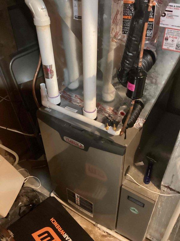 Performed scheduled preventive maintenance tuneup on a Lennox furnace system. Inspected all components including PVC exhaust/intake ventilation, copper lines, and ductwork. All systems functioning properly with no issues identified.