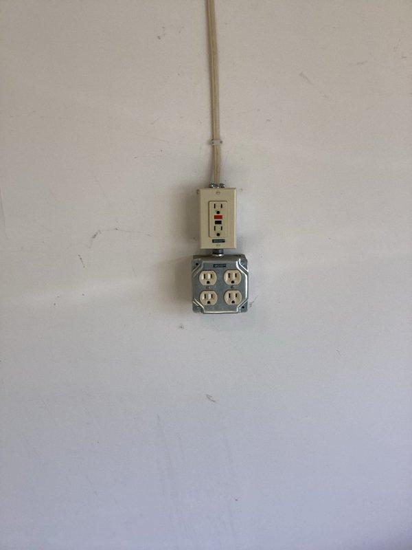 Performed comprehensive electrical inspection as scheduled. Identified non-GFCI washer outlet requiring upgrade for code compliance. Inspected ceiling fan installation in kitchen area and provided estimate for necessary electrical modifications.