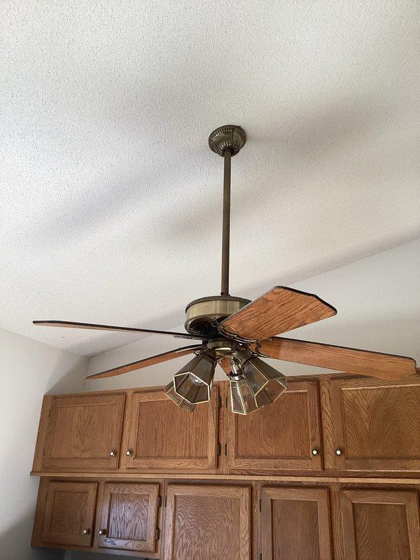 Performed comprehensive electrical inspection as scheduled. Identified non-GFCI washer outlet requiring upgrade for code compliance. Inspected ceiling fan installation in kitchen area and provided estimate for necessary electrical modifications.