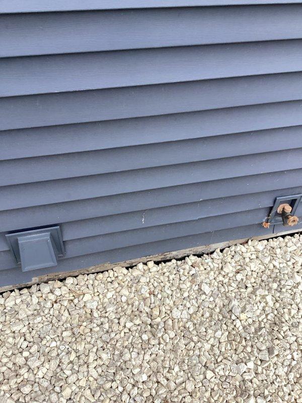 Inspected exterior spigot relocation requirements and existing plumbing infrastructure. Assessed feasibility of disconnecting old outdoor faucet and installing new frost-free fixture. Evaluated optimal pathway for running 3/4" copper pipe vertically through subfloor into kitchen cabinet and out through exterior wall, ensuring proper connections and weather resistance.