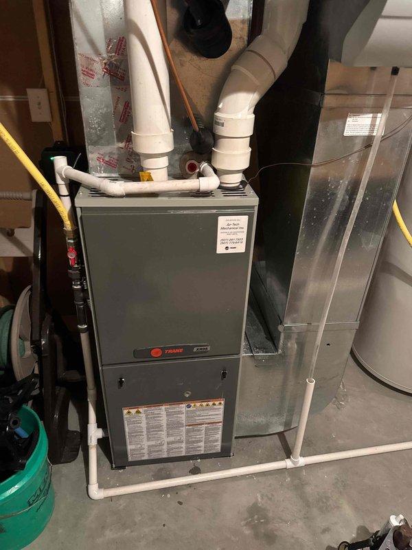 Diagnosed Trane furnace that was running continuously without producing heat. Unit was found to be tripping on high limit switch due to age-related component failure. Informed customer that system replacement is recommended and scheduled follow-up appointment for replacement estimate.