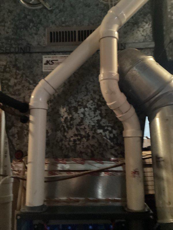 Performed scheduled preventive maintenance agreement service on HVAC system. Conducted comprehensive tune-up with focus on condensate drainage system, inspecting PVC piping network and connections. All components functioning properly; no issues identified.