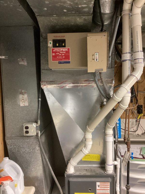 Diagnosed heat pump system that was not automatically switching to emergency heat mode. Inspection revealed failed plenum heater causing the homeowner to manually switch between heat pump and furnace operation. System requires either plenum heater replacement or thermostat upgrade to restore proper changeover functionality.