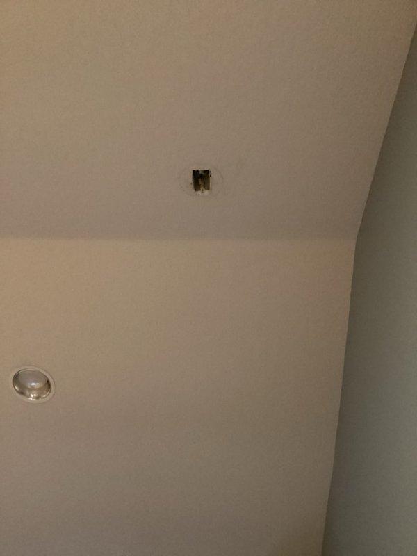 Responded to service call for chirping smoke detector. Upon inspection, removed improperly located smoke alarm and installed blank cover plate over existing electrical box. Customer was advised that additional smoke detectors may need service on a follow-up visit due to height constraints and piano placement beneath installation area.