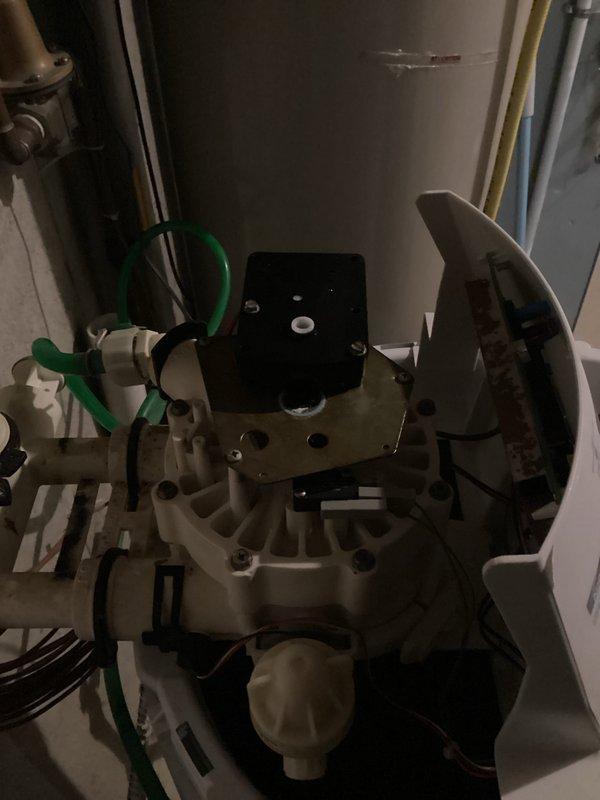 Responded to priority service call for water softener repair. Diagnosed malfunctioning timer control module on unit and replaced water softener repair kit. Cleaned interior chamber components including circular valve assembly and O-ring which showed significant mineral buildup and discoloration. Customer advised of additional replacement options and estimate provided for complete unit replacement if desired.