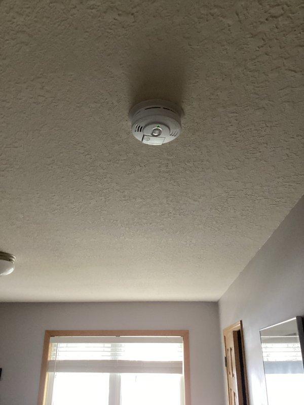 Completed installation of 8 safety devices throughout customer's residence, including 5 standard smoke detectors and 3 smoke/CO2 combination units. Performed comprehensive replacement of all existing detection equipment to ensure proper home safety coverage. Visual inspection confirmed proper mounting and functionality of all newly installed devices.