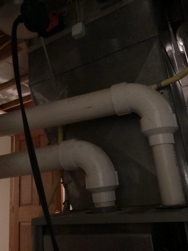 Performed scheduled one-time furnace tune-up service on residential HVAC system. Conducted comprehensive inspection of the furnace unit, including examination of internal components (motor assembly, wiring connections, and ventilation system). Verified proper installation and function of PVC exhaust pipes and drainage connections. System was returned to normal operating condition after maintenance.