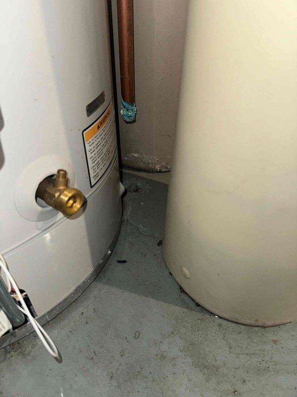 Responded to service call for reported water leak near recently installed furnace. Upon inspection, determined water was not coming from water heater but identified two separate leak sources: drain line and customer's Culligan water softener brine tank. Advised customer to contact Culligan for repairs to their equipment.