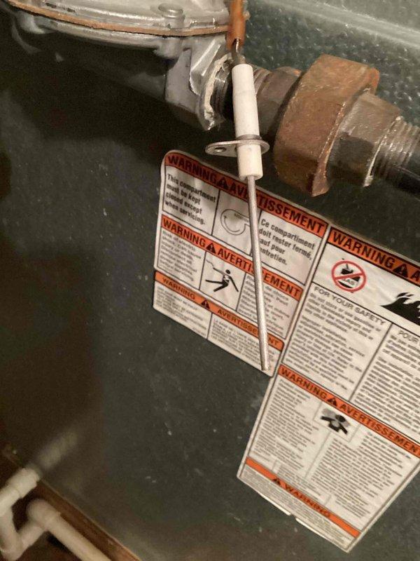 Responded to no-heat service call for 10+ year old furnace that had failed over the weekend but was operating intermittently at time of arrival. Diagnostic testing identified dirty flame sensor as root cause of heating failure. Removed and thoroughly cleaned flame sensor, restoring proper ignition sequence and reliable system operation.