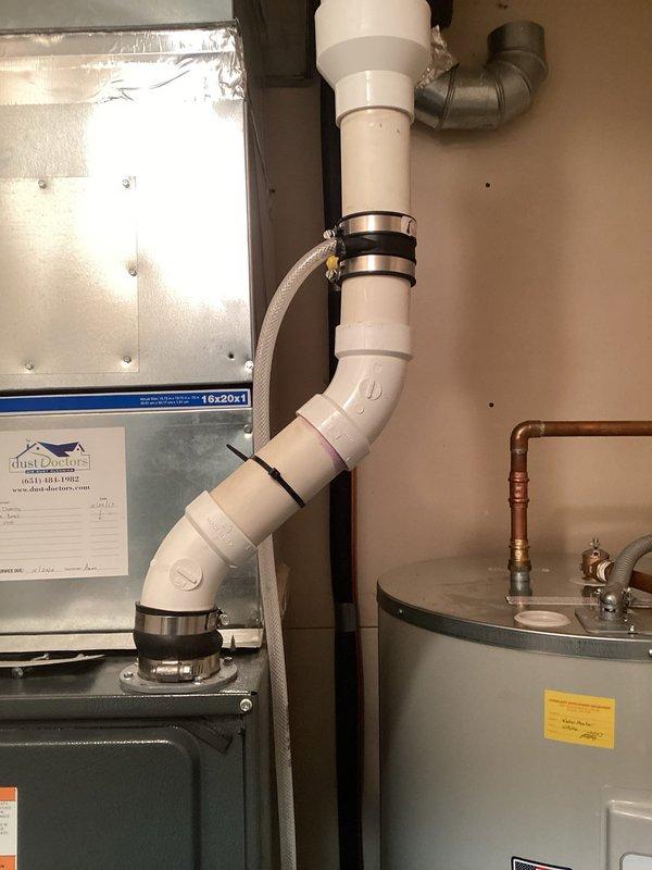 Responded to service call for furnace malfunction caused by water in inducer assembly preventing pilot ignition. Diagnosed condensate drainage issue and installed Y-trap on exhaust system to prevent water backup. System now operating normally with proper condensate drainage.