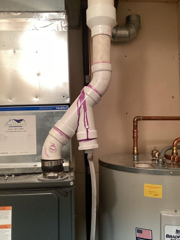 Responded to service call for furnace malfunction caused by water in inducer assembly preventing pilot ignition. Diagnosed condensate drainage issue and installed Y-trap on exhaust system to prevent water backup. System now operating normally with proper condensate drainage.