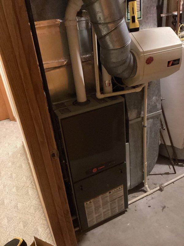 Responded to emergency no-heat call at residence where homeowner was away. Performed diagnostic evaluation on Trane furnace system and identified failed inducer motor as the source of malfunction. Successfully replaced inducer motor, restoring proper heating system operation.