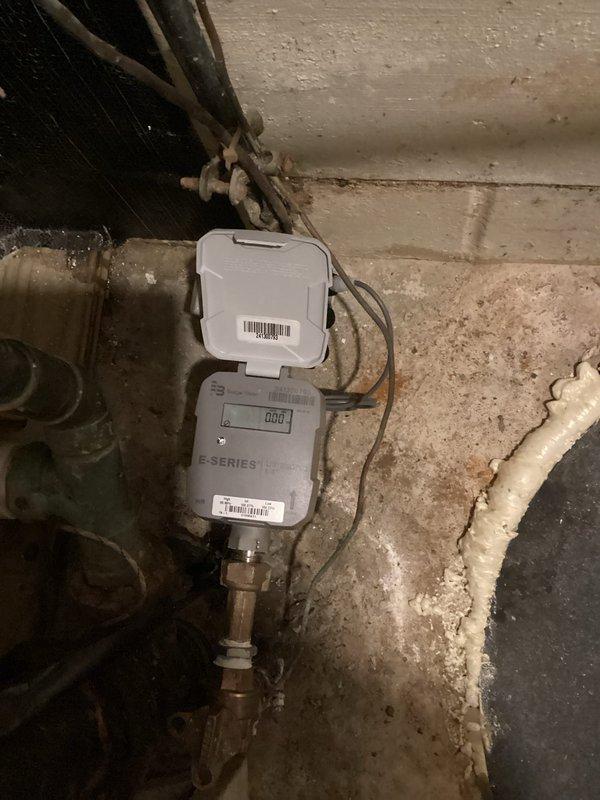 Responded to service call for suspected water leak causing floor damage in kitchen and dining room. Performed comprehensive inspection of water supply lines, drain systems, and ceiling in basement with no active leaks detected. Inspected water meter and documented readings with E-Series meter showing normal operation.