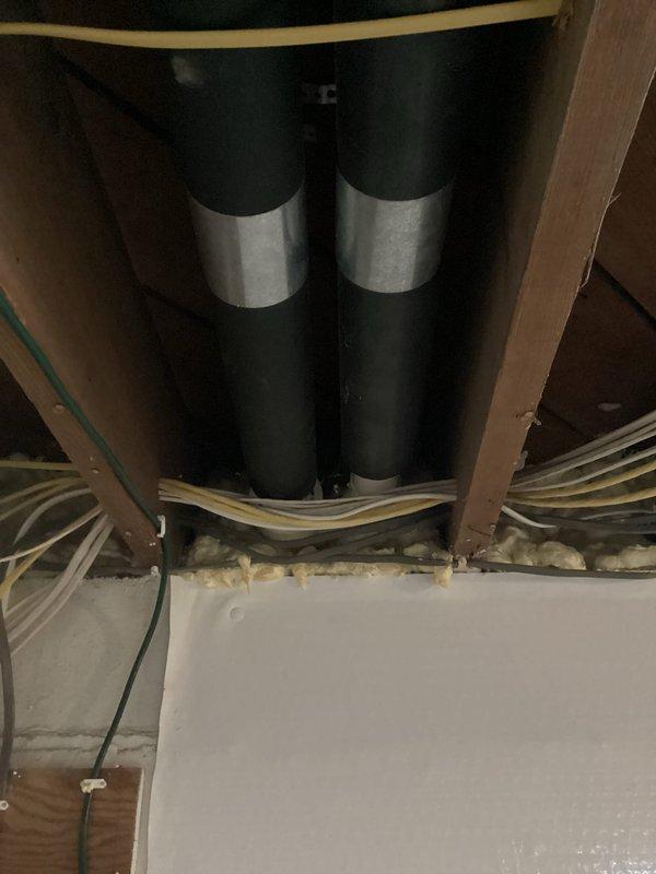 Completed furnace tune-up and inspection with all systems functioning properly. Installed new flue pipe to ensure proper ventilation, documented by photos showing interior ductwork and exterior exhaust vent. Coordinated with Brandon's crew to address venting requirements.