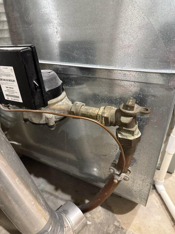 Performed diagnostic assessment of main line shut-off valve prior to water meter, confirming complete failure to close. Documented existing valve condition with photos showing significant mineral buildup and wear. Coordinated with Rochester Public Utilities to schedule installation of replacement shut-off valve.