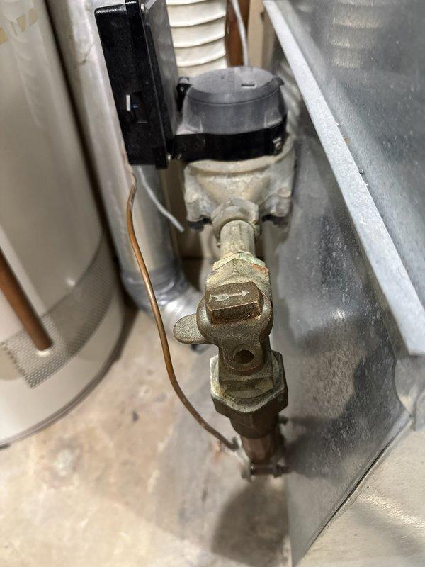 Performed diagnostic assessment of main line shut-off valve prior to water meter, confirming complete failure to close. Documented existing valve condition with photos showing significant mineral buildup and wear. Coordinated with Rochester Public Utilities to schedule installation of replacement shut-off valve.