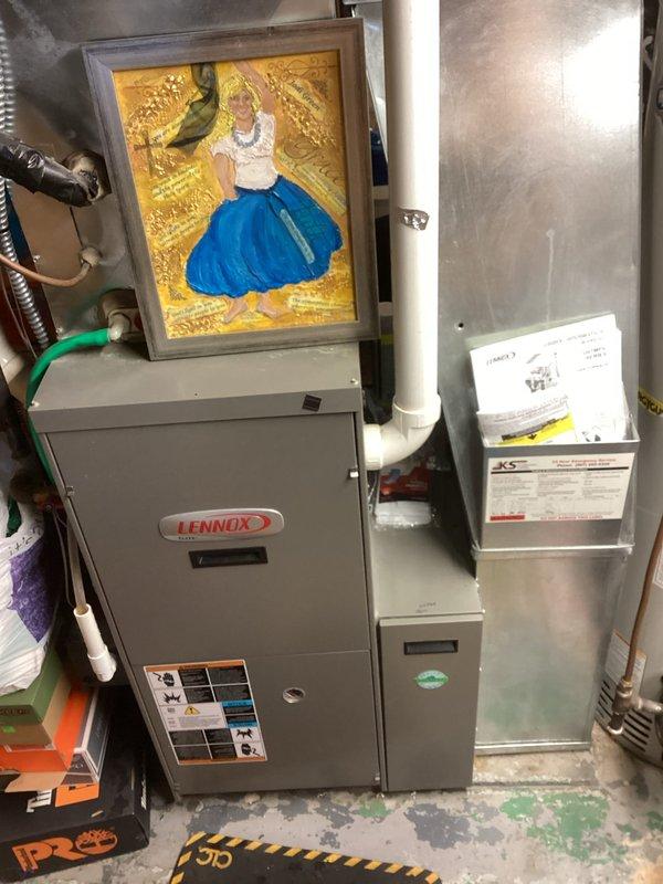 Diagnosed no heat issue on older Lennox furnace system. Found water accumulation in pressure switch tubing causing furnace failure. Cleared blocked pressure switch lines which restored proper operation of heating cycle while maintaining fan functionality.