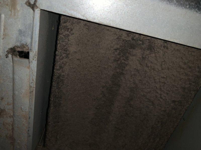 Responded to no-heat service call for aging furnace (10+ years). Diagnosed E311 error code indicating heat limits due to restricted airflow. Performed cleaning of secondary heat exchanger and removed heavily contaminated filter that was causing airflow restriction. System restored to proper operating condition.