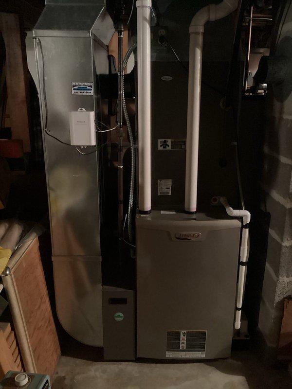 Diagnosed no heat condition on Lennox furnace system. Troubleshooting identified failed pressure switch as root cause. Removed and replaced defective pressure switch (P/N 103016-01) with new component. Verified proper system operation after repair with successful ignition and heat cycle.