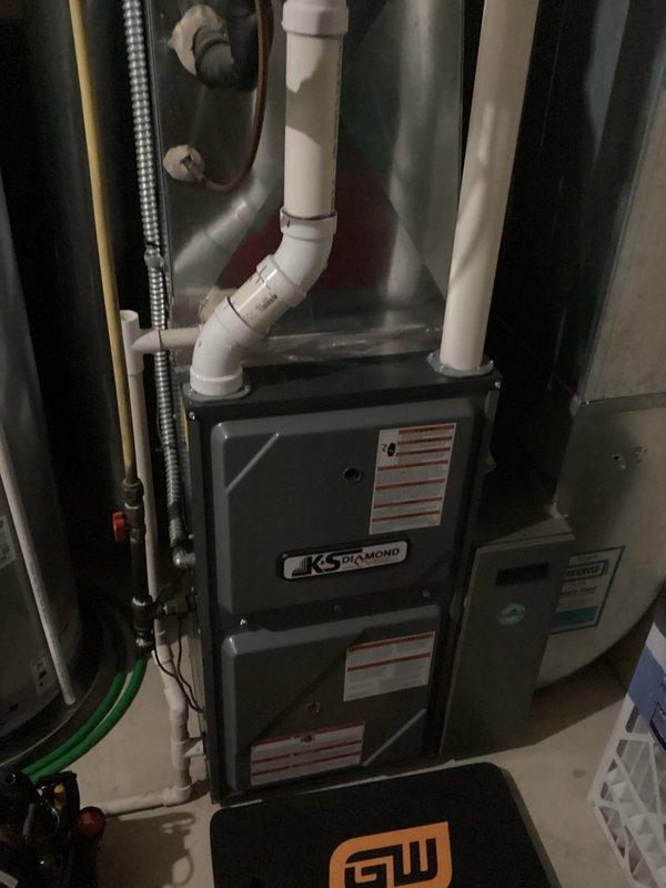 Performed scheduled tune-up service on KS/Diamond branded furnace unit. Conducted comprehensive system inspection including condensate drain lines, PVC exhaust venting, and all connections. System functioning properly with no issues identified; all components in good working order.