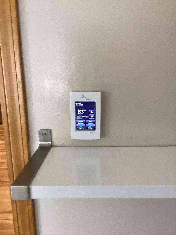 Replaced outdated floor heating thermostat that was malfunctioning with temperature control issues. New programmable digital thermostat installed and tested to ensure proper operation of the WarmTiles heating system. Verified circuit breaker connection at main panel to ensure proper power supply to the new thermostat.