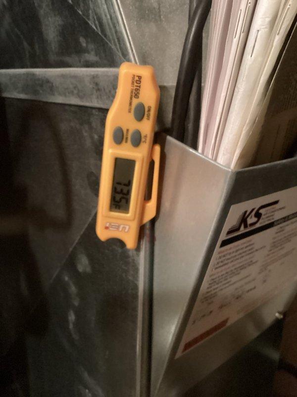 Responded to callback for furnace not operating properly after previous pressure switch replacement. Upon arrival at 12:4, unit was running but not producing adequate heat. Diagnostic testing revealed temperature differential issues (13.5°F supply air vs. 75.5°F return air). Resolved by adjusting fan speeds to optimize system performance and restore proper heating function.