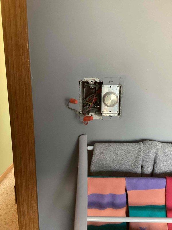 Responded to service call for faulty bedroom lighting control. Diagnosed and replaced defective rotary dimmer switch. Removed old unit, properly terminated existing wiring with wire caps, and installed new rotary dimmer switch to restore proper lighting functionality.