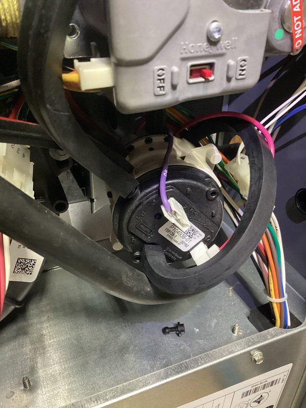 Responded to no heat call where furnace was not turning on with frozen exterior exhaust. Diagnostic testing revealed inducer motor was functioning properly but pressure switches were not responding. Replaced faulty pressure switch to restore proper system operation and heat.