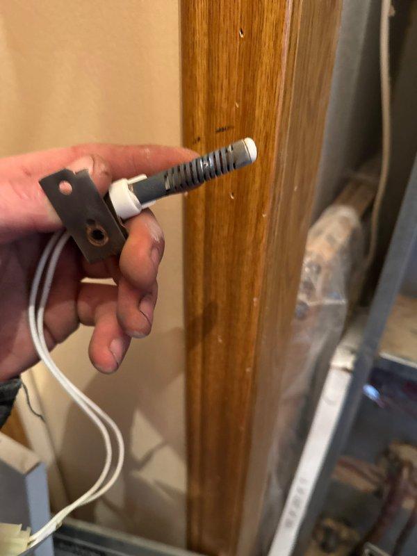 Responded to no heat complaint on 10+ year old furnace. Diagnostic testing revealed failed hot surface igniter preventing system ignition. Replaced defective igniter component and verified proper system operation, restoring heat to the residence.