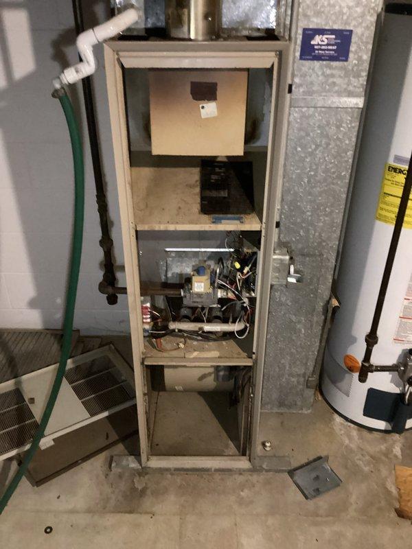 Responded to no heat call for aging furnace system. Diagnosed issue with seized blower motor causing system failure. Performed maintenance by lubricating motor and replaced blown fuse, successfully restoring heat operation.