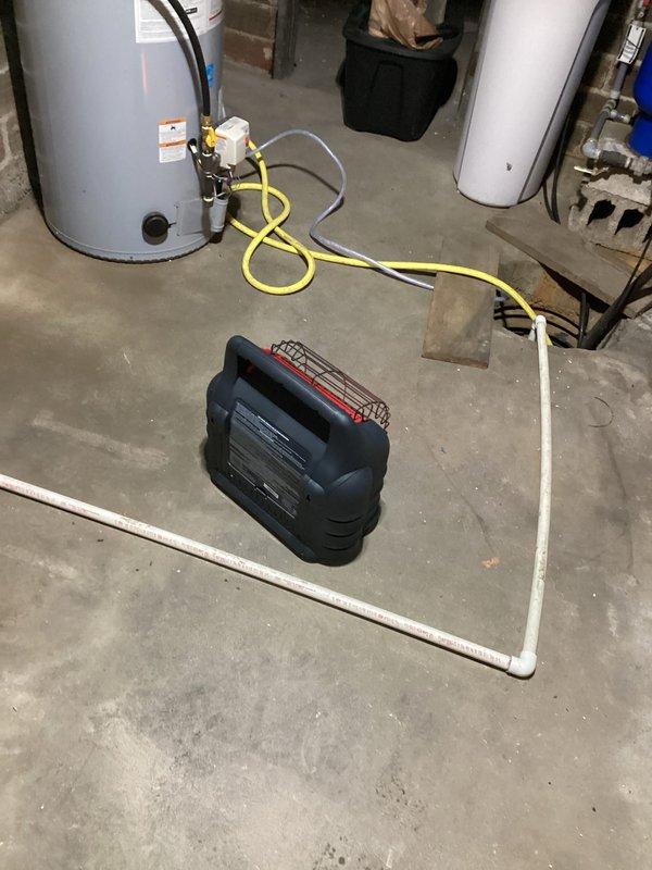 Responded to no heat complaint caused by frozen condensate drain line due to oversized fresh air return. Plugged the fresh air return and installed a temporary condensate line with pump to restore system operation.