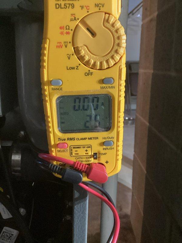 Responded to emergency no-heat call for furnace not producing warm air. Diagnosed two issues: excessive gas pressure and improperly installed concentric vent diverter plate. Corrected gas pressure to manufacturer specifications and properly repositioned combustion chamber door, restoring proper operation. Verified proper operation using multimeter and combustion analyzer testing.