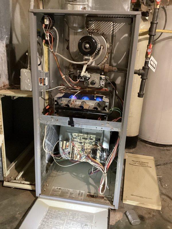 Responded to emergency no-heat call for aging furnace system. Diagnostic testing revealed failed blower motor preventing adequate heat distribution throughout home. Removed defective blower assembly and installed replacement unit, restoring proper system operation and heat output.