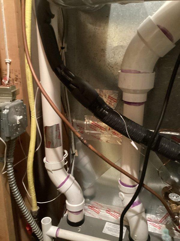 Performed scheduled tune-up service on Lennox furnace system with arrival between 8-12 as arranged. Conducted comprehensive inspection and maintenance of air handler unit, including examination of PVC ventilation pipes, electrical connections, and refrigerant lines. System was found to be in proper working condition with no issues identified.
