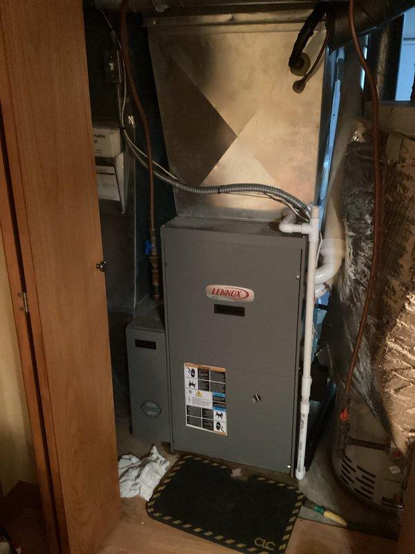Responded to no heat call for Lennox furnace system. Diagnosed frozen condensate drain line causing system failure. Replaced affected section of condensate drain line, restoring proper system operation and heat production.