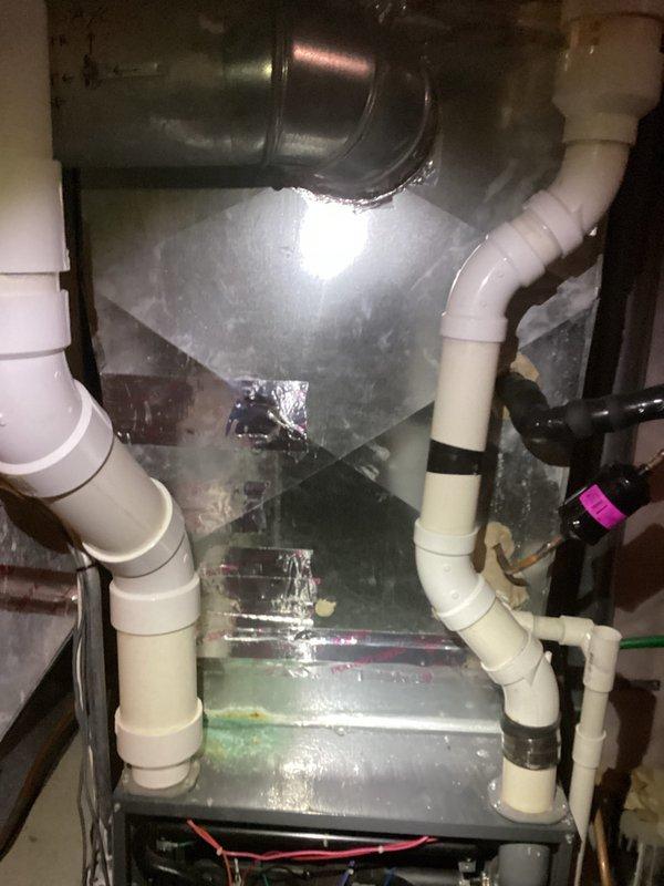 Performed scheduled preventative maintenance on residential air handler/furnace system. Completed comprehensive tune-up service including inspection of condensate drainage components, PVC vent piping, and electrical connections. System functioning properly with no operational issues identified.
