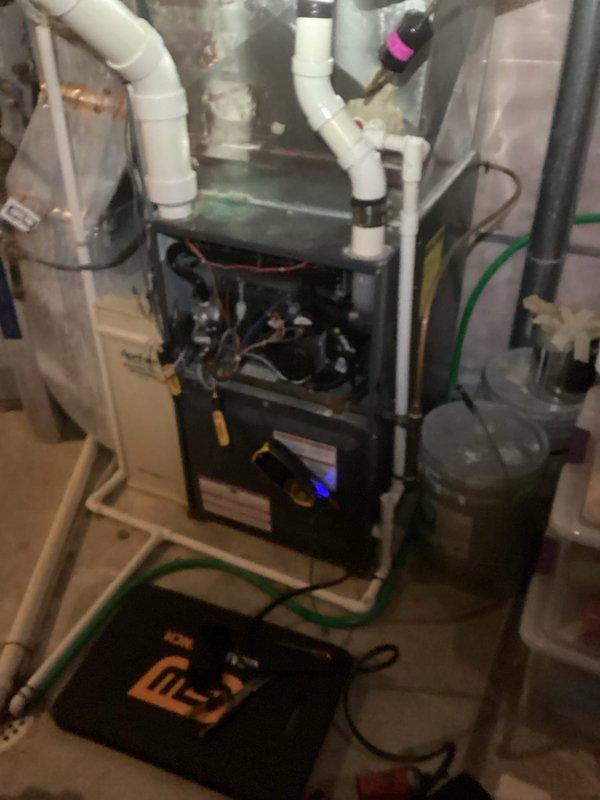 Performed scheduled preventative maintenance on residential air handler/furnace system. Completed comprehensive tune-up service including inspection of condensate drainage components, PVC vent piping, and electrical connections. System functioning properly with no operational issues identified.