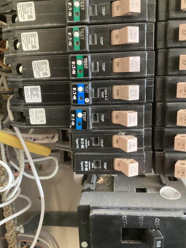 Diagnosed and resolved issue with breaker repeatedly tripping for dishwasher and garbage disposal circuit. Identified faulty 20 amp dual function breaker as root cause. Replaced with new 20 amp dual function Cutler Hammer breaker with tan handle, restoring proper functionality to the circuit.