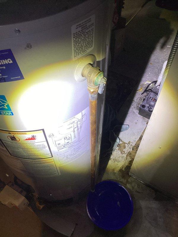 Responded to service call for a leaking water heater. Diagnosed a faulty temperature and pressure relief (T&P) valve that had been leaking for several months. Removed the defective valve and installed a new T&P valve, resolving the leak. System tested and confirmed to be functioning properly after repair.