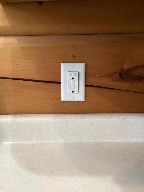 Responded to service call for non-functional outlet used during duct cleaning. Diagnosed faulty GFCI outlet. Removed defective unit and installed new GFCI outlet on wooden wall, verifying proper operation after installation.