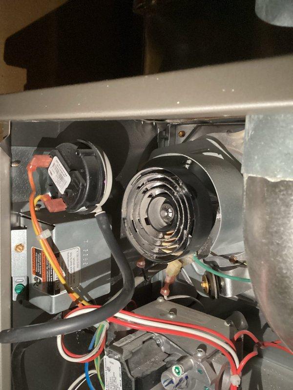Diagnosed furnace with no heat condition; identified failed inducer motor as root cause. Replaced inducer motor assembly, restoring proper operation of heating system.