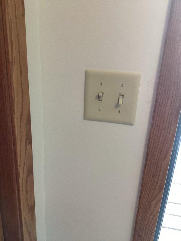 Responded to service call for non-functioning outdoor light and three outlets. Diagnosed issue as a loose connection at the wall switch that was previously serviced. Tightened connection and verified proper operation of all affected fixtures.